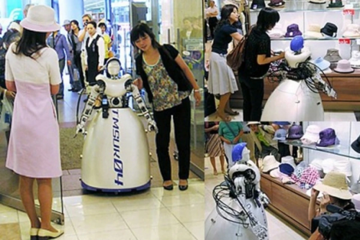 The TMSUK robot shops till you drop.Pic via Pink Tentacle.