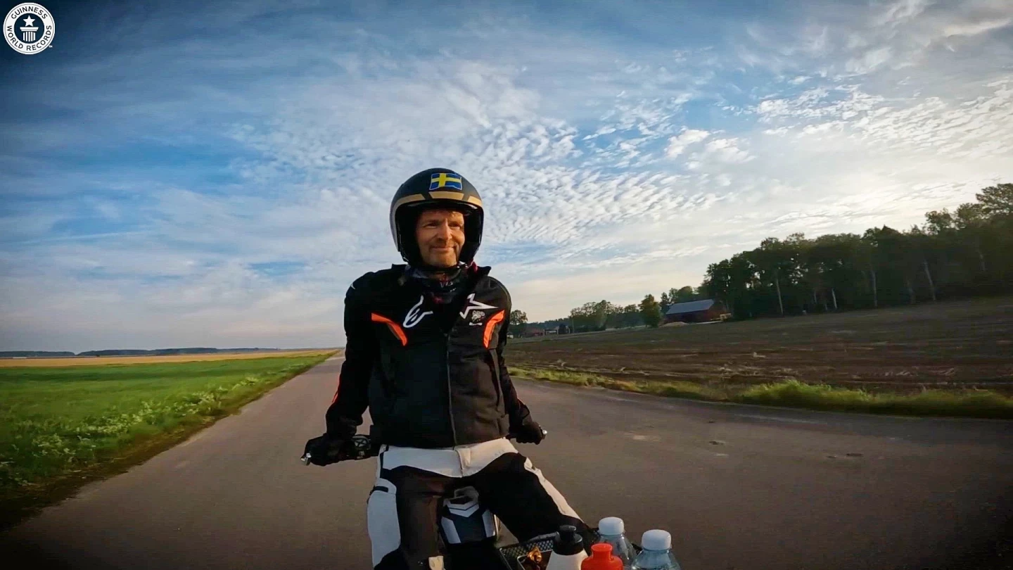 The stunt rider also claimed another world record for the longest distance ridden sitting backwards on a motorcycle