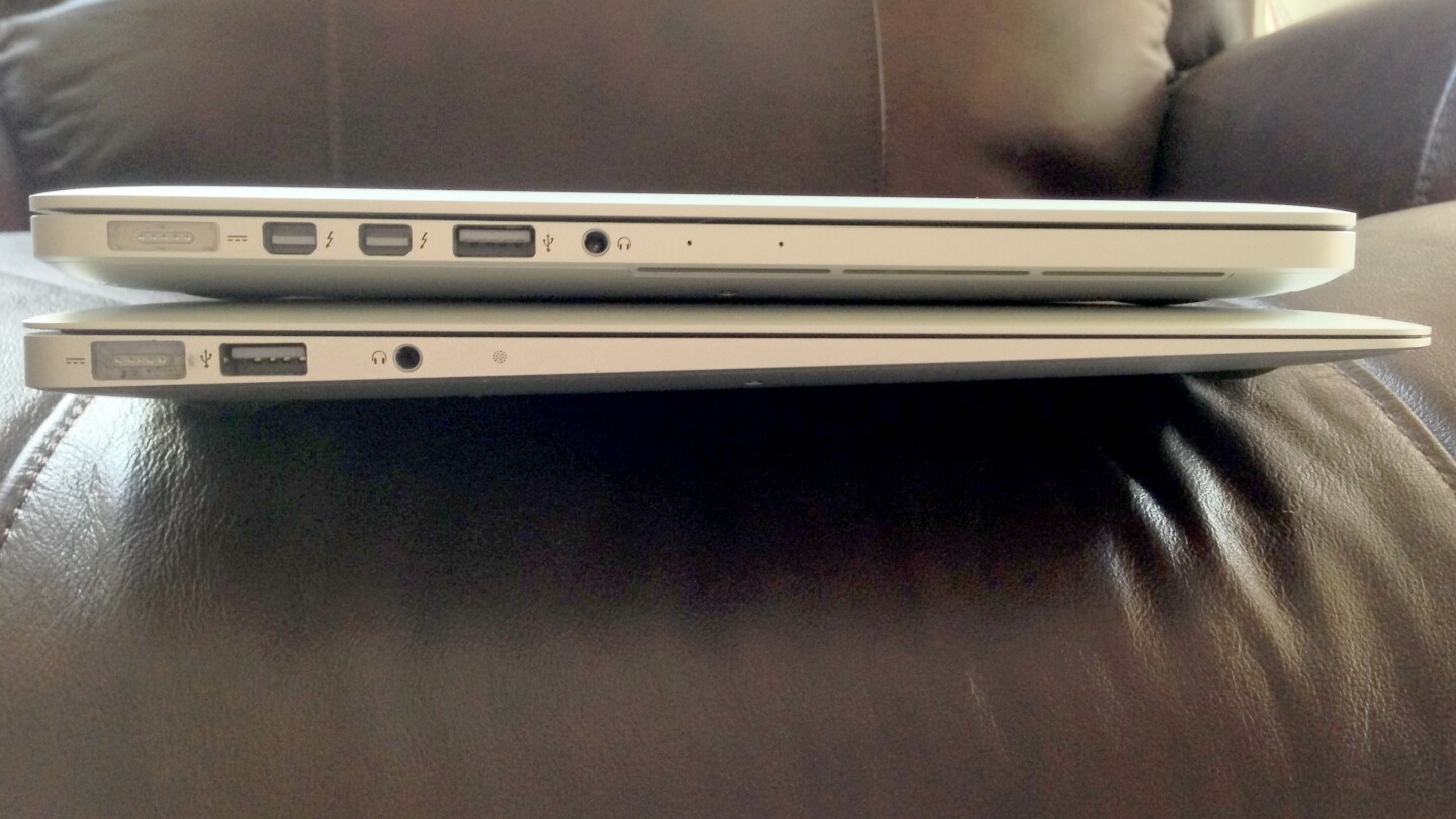 The 13-inch Retina MacBook Pro (top) is thicker than the 13-inch MacBook Air (bottom) - but not by a huge margin