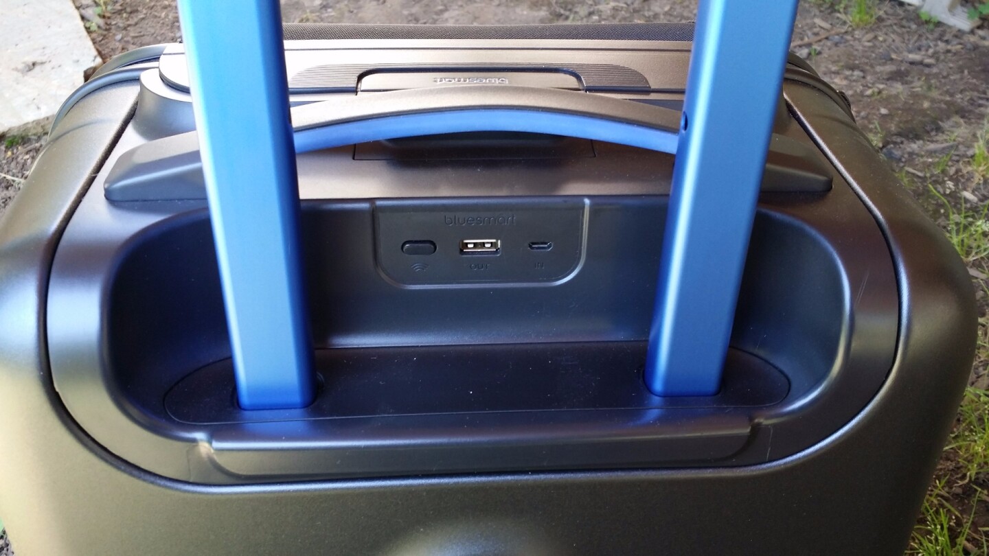 A port behind the handle lets you charge the bag and subsequently, your devices