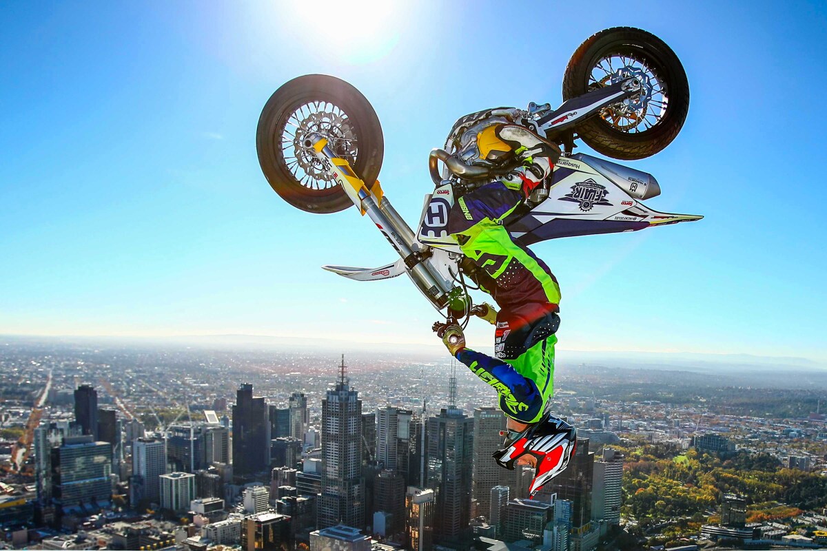Gold, View. World Champion Trials bike rider Jack Field performs the highest backflip on a motorcycle ever recorded as he flips his motorbike upside down on the roof of Melbourne's Eureka Tower on May 22, 2019 in Melbourne, Australia