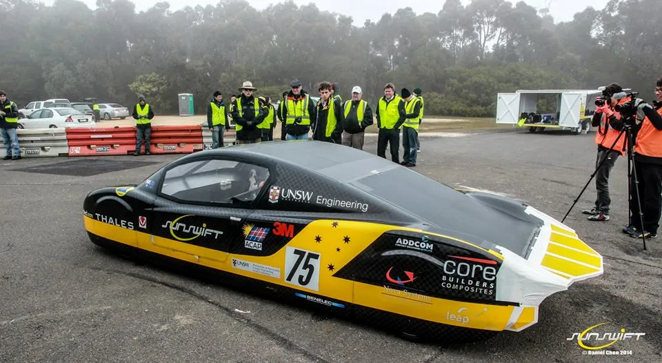 Members of the Sunswift team and the eVe after it's record-breaking run (Photo: Sunswift / Daniel Chen)