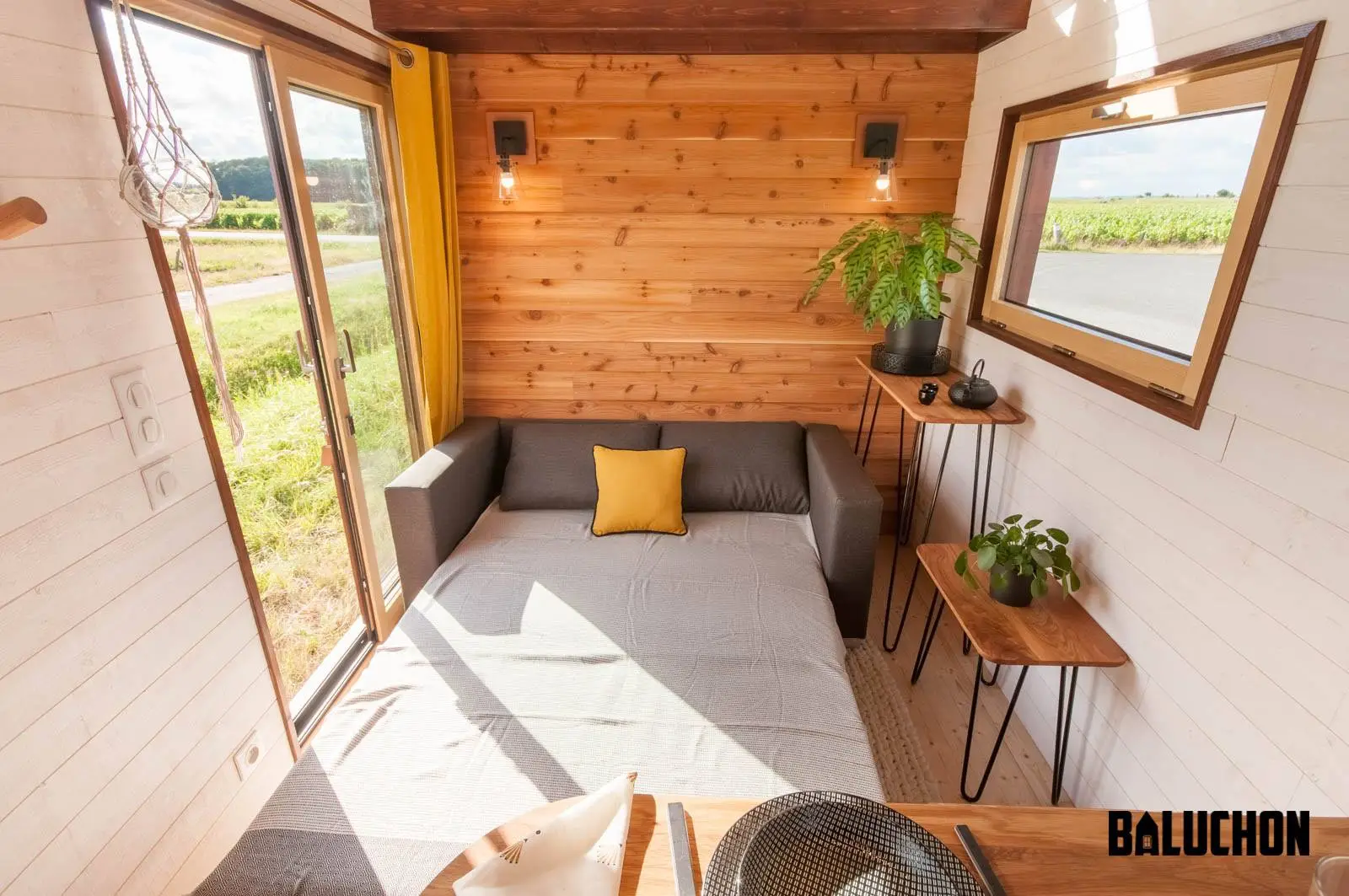 The Pampille's living room includes a sofa bed that sleeps two people