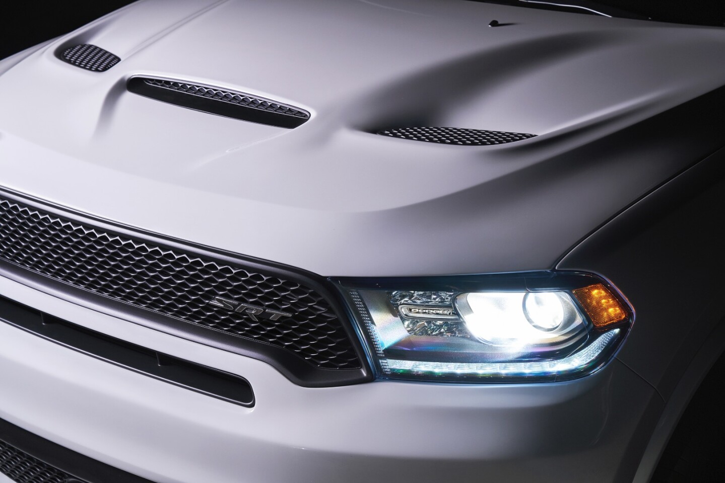Aggressive intakes, akin to those found on the Challenger SRT models like the Hellcat and Demon, are part of the Durango SRT's build as well
