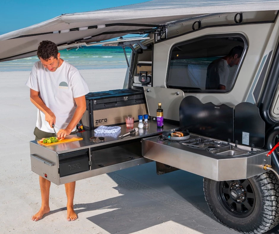 Unlike many kitchens that rely heavily on sink and stove lids as countertop, ARB's Slide Kitchen offers a clean stainless steel worktop that's over a meter long