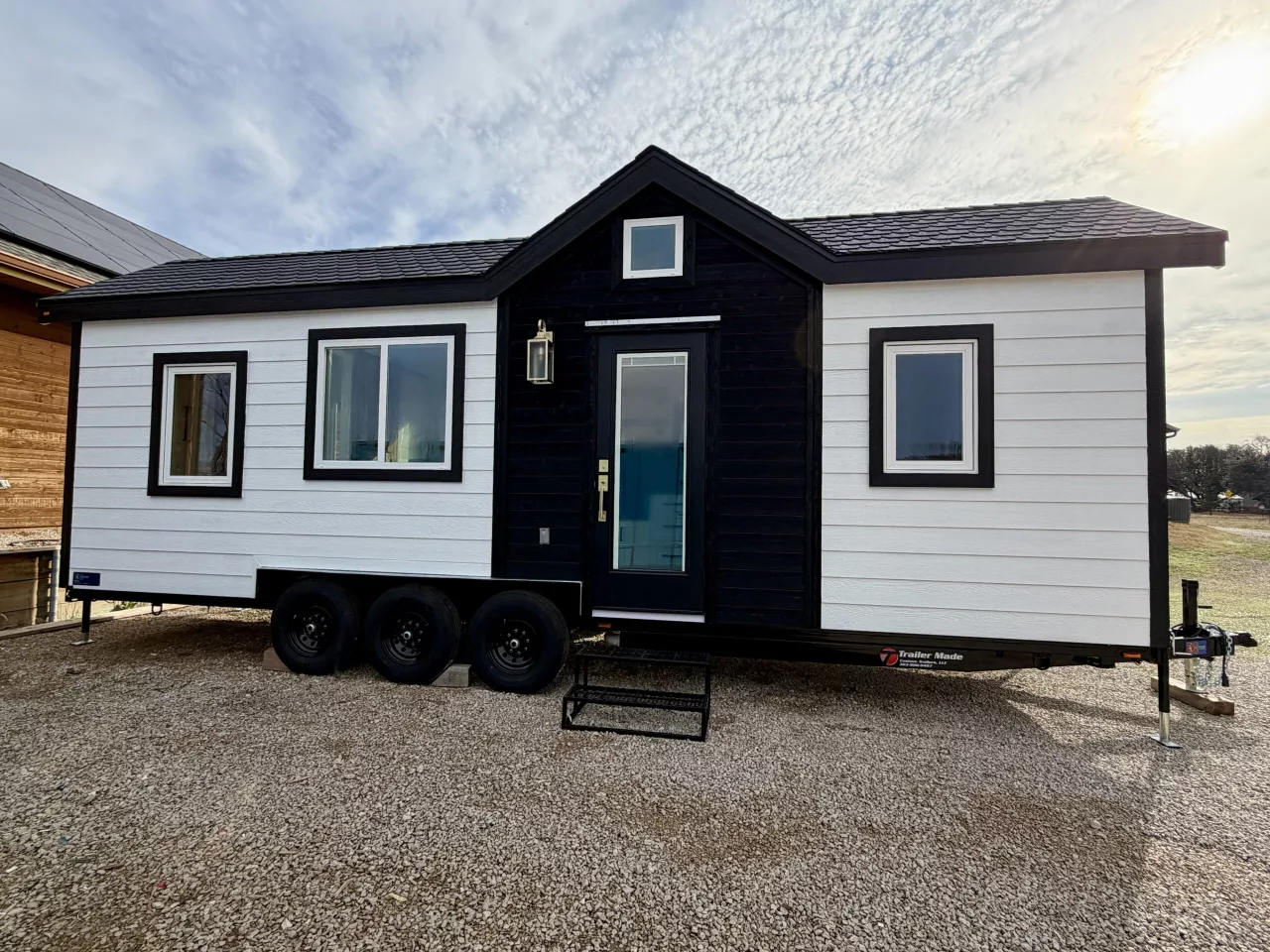 The Betty tiny house is a compact towable home for two that packs in lots of storage and a well-designed interior