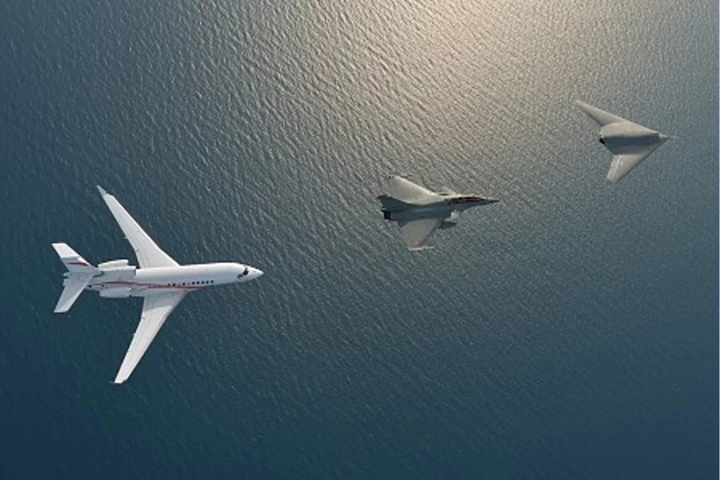 The flight included the nEURON, a Rafale fighter, and a Falcon 7X business jet