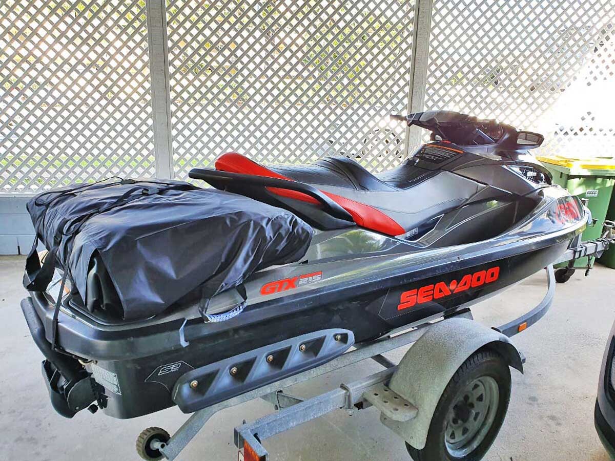 Dockitjet's inflatable boat can be flatpacked and strapped to the rear of a jetski for easy transport