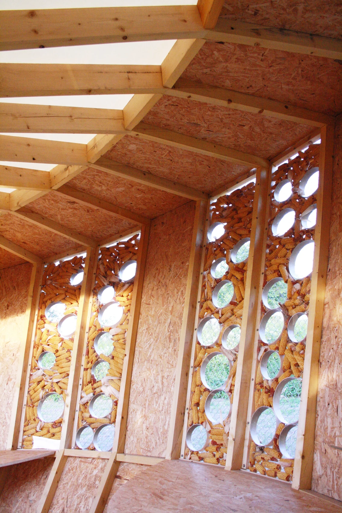 Round windows match the home's corn cob theme