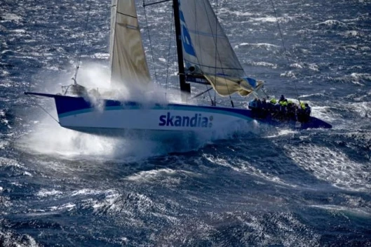SKANDIA launches off a wave near Tasman Island Photo: Carlo Borlenghi
