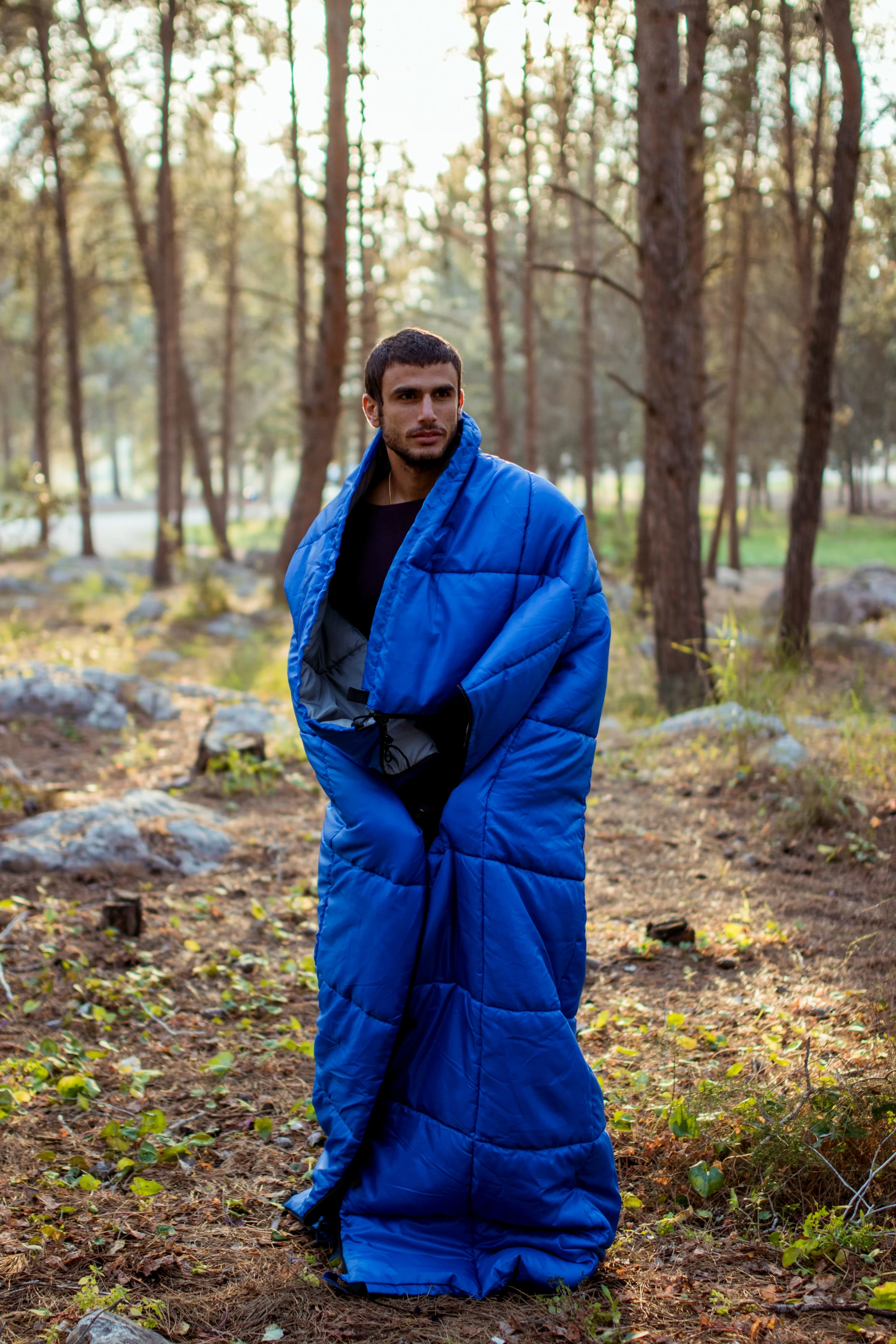 The sleeping bag-like quilt can be wrapped around the Koala to provide insulation or used around camp