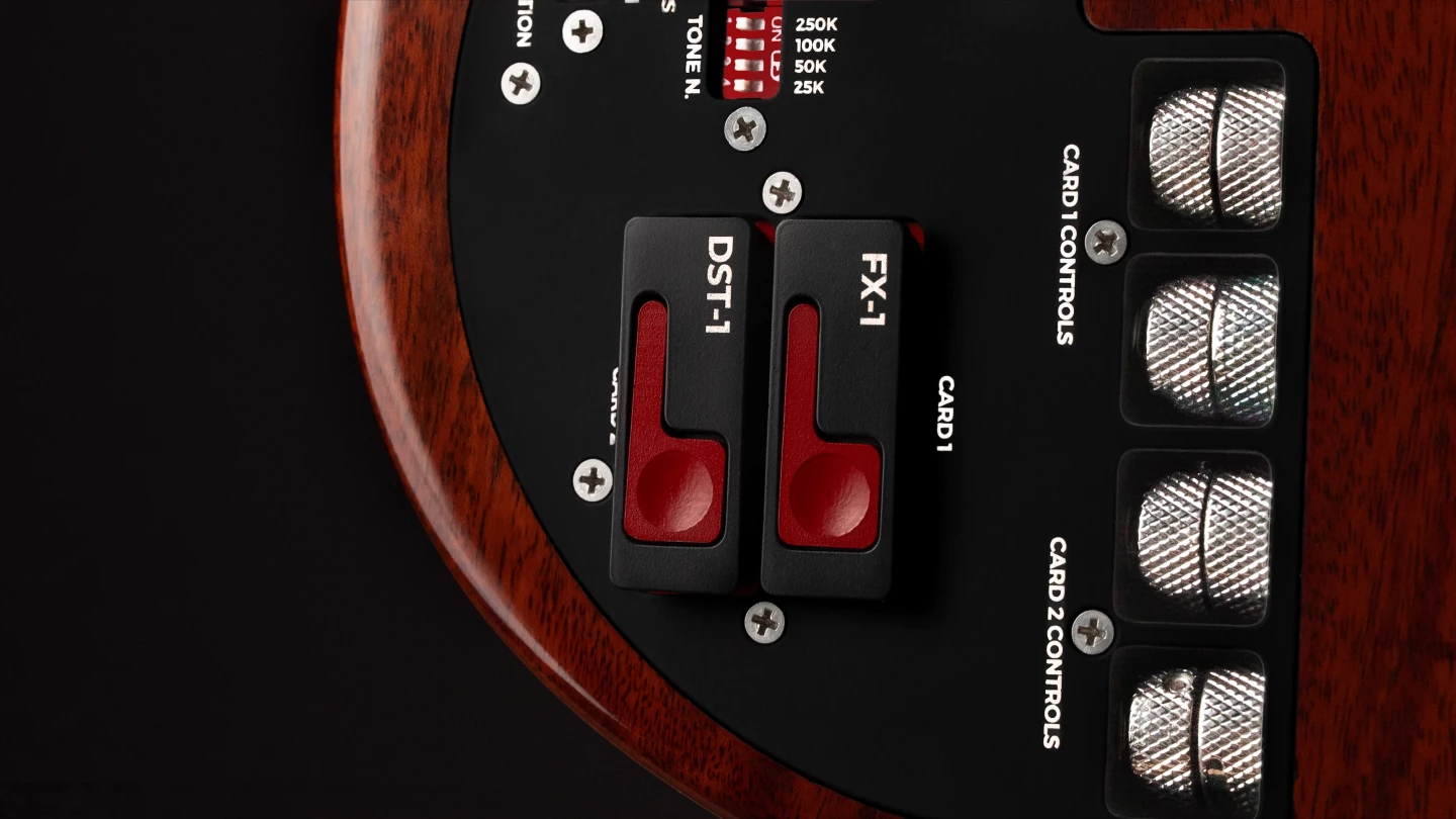 The rear panel features slots for FX Cards, effects knobs, and pickup tone shaping controls