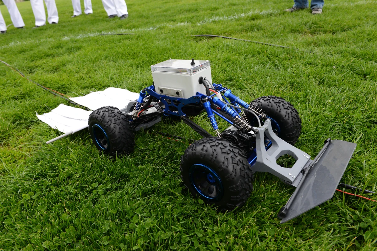 The tick rover drags an insecticide-laced cloth behind it (Photo: VMI Photos by John Robertson IV)