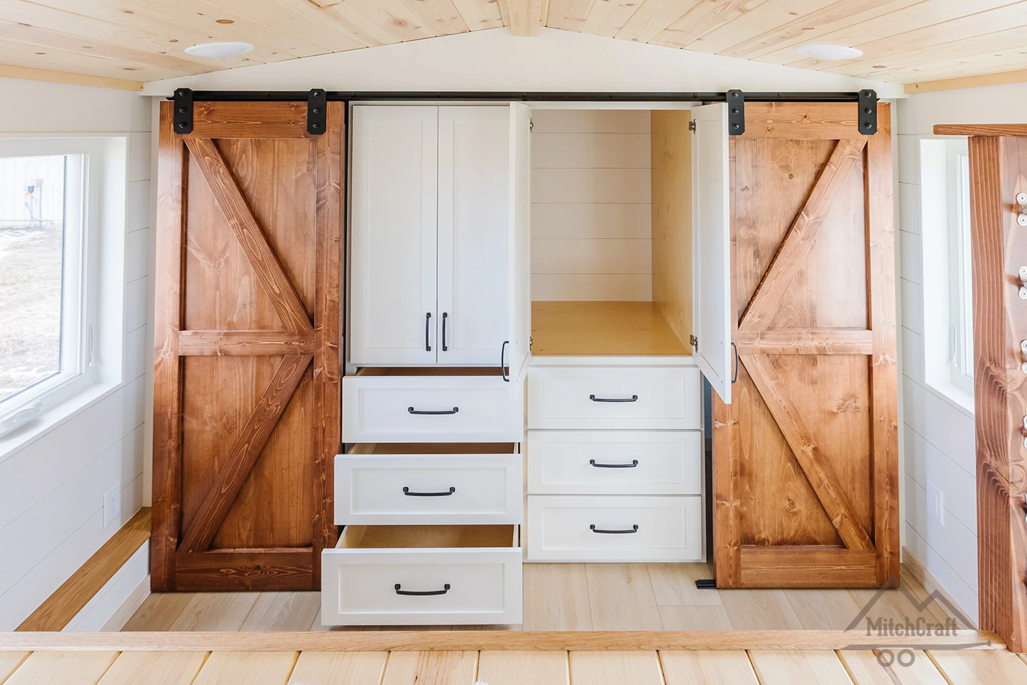 The CC 31' x 10' includes a large storage area upstairs, next to the bedroom