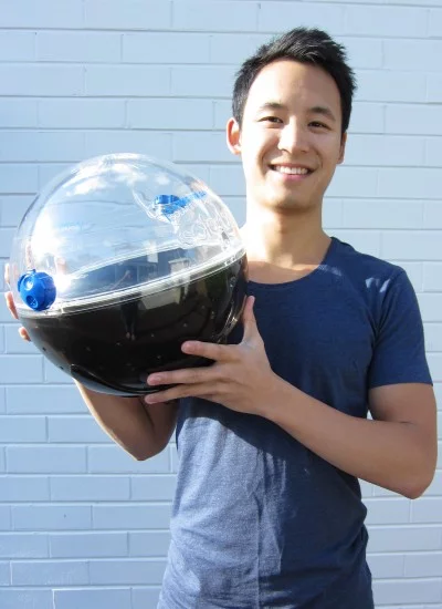 Inventor Jonathan Liow and the Solarball, which creates clean drinking water through evaporation and condensation