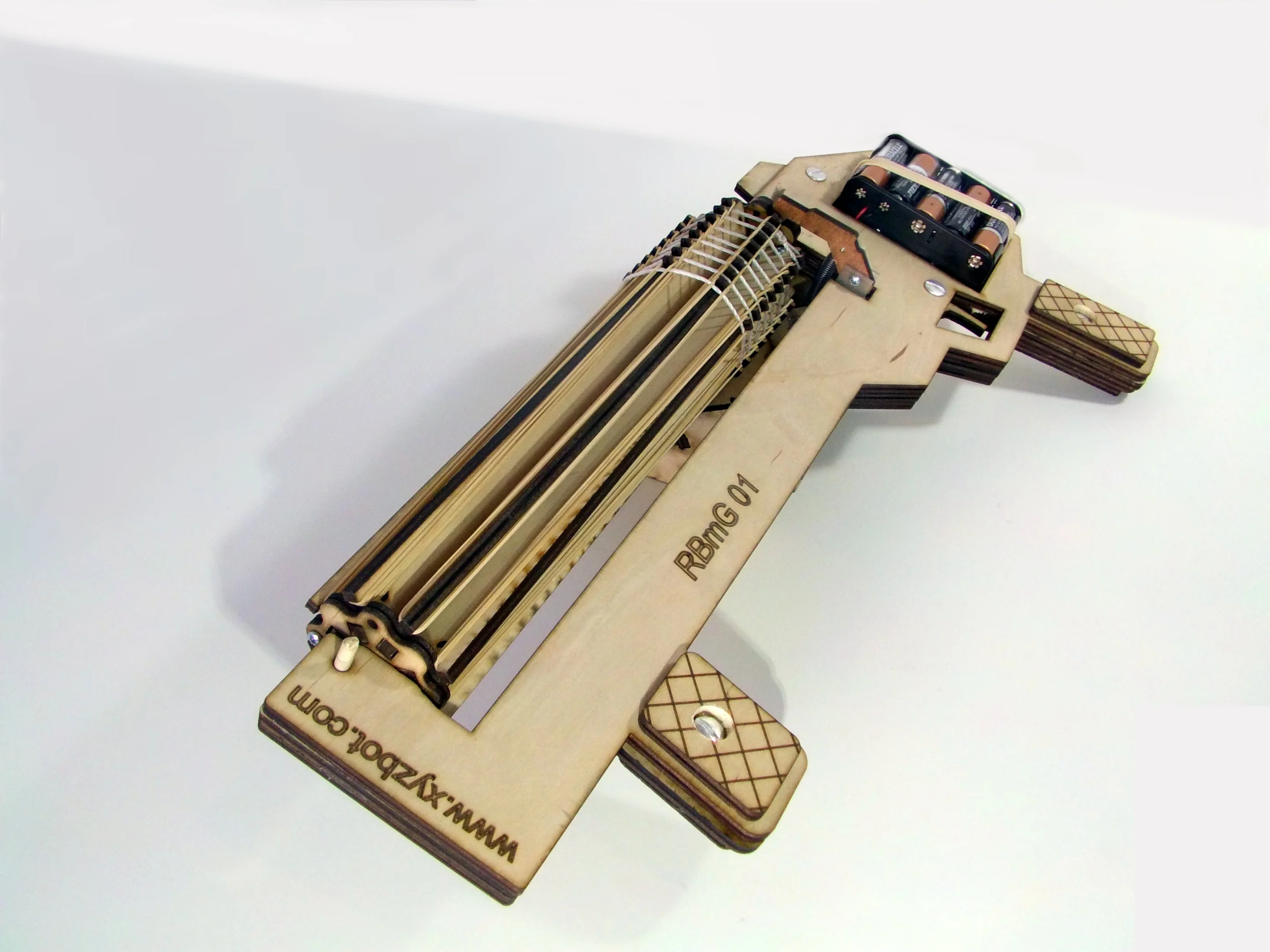 With its Rubber Band Machine Gun, or RBmG for short, XYZbot hopes to bring a new level of firepower to living room warfare