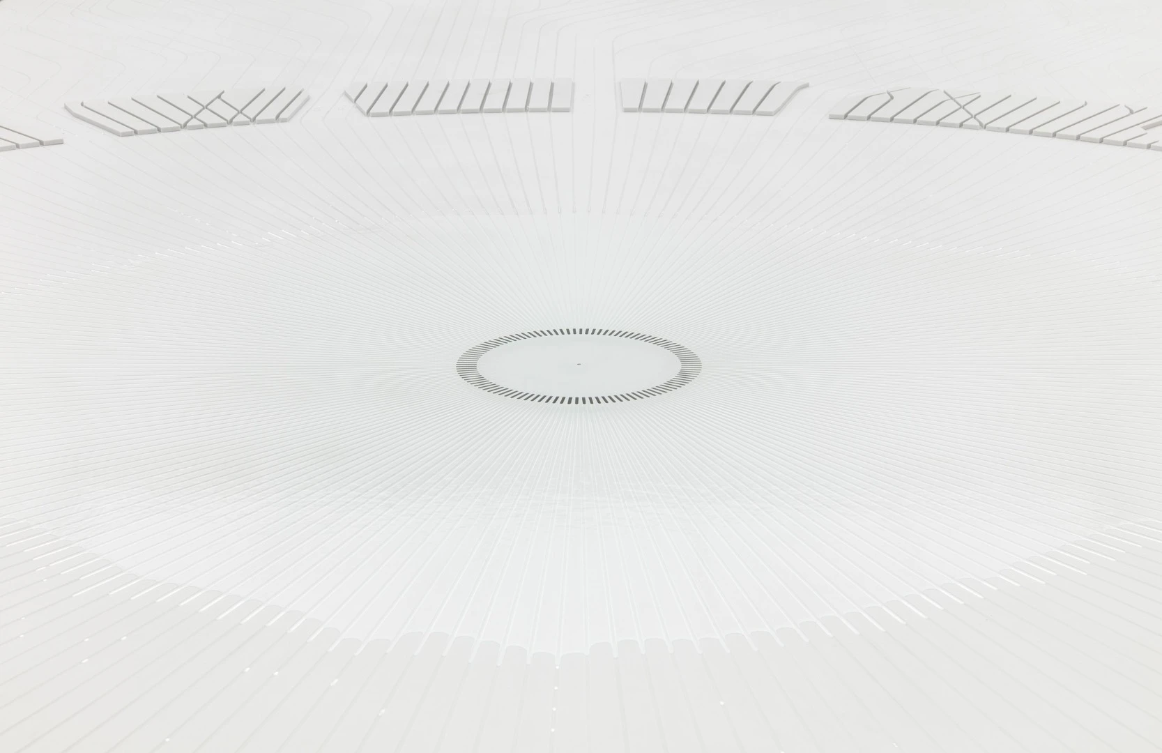 The water installation inside uses water droplets to create a visage resembling the sight of a giant city from space