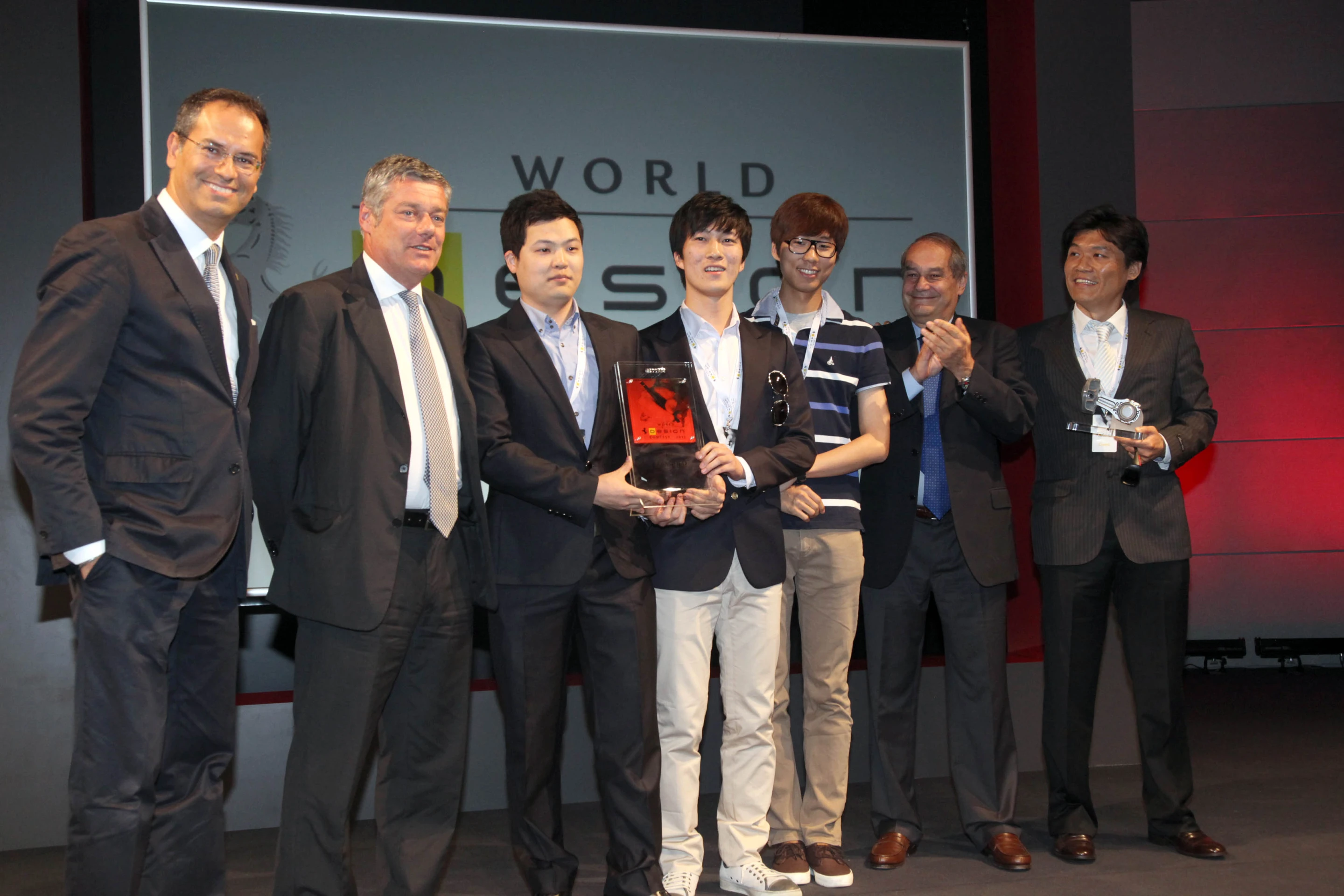 Eternita concept designers from Hongik University accept the first place award from Flavio Manzoni, Amedeo Felisa and Paolo Pininfarina