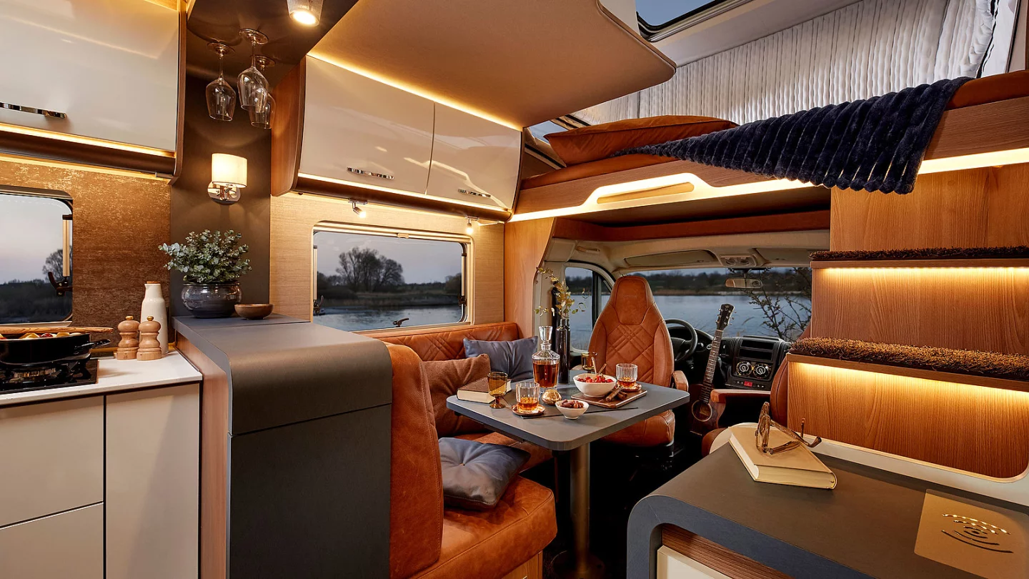 The Bürstner Lyseo Gallery seats four on the drive and has a front dinette with L bench and swivel cab seats