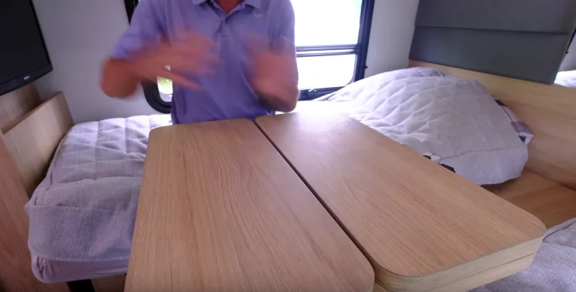 The dining table can also mount between the beds