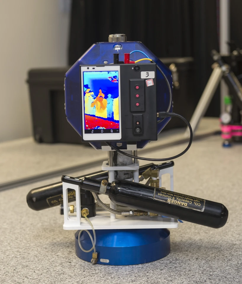 Equipped with depth sensing, motion tracking cameras and computer vision software, Google's Project Tango smartphone will help the SPHERES navigate the ISS (Photo: NASA Ames / Eric James)