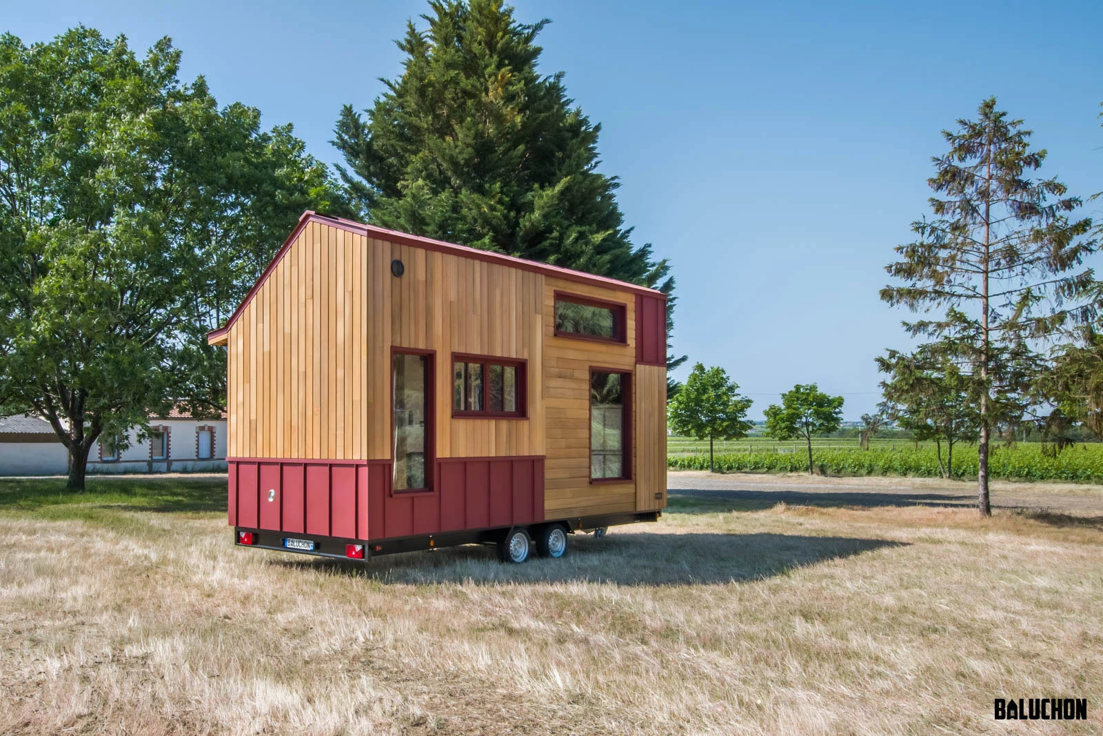 The Browny is finished in red cedar, with aluminum accenting and roof