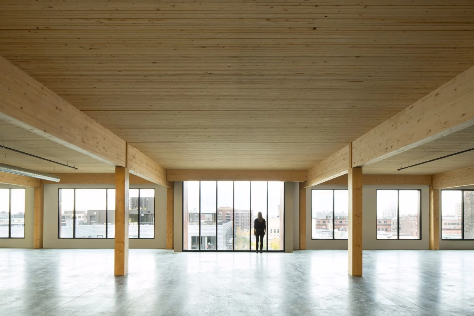 T3 boasts 11-ft (3.3-m) high exposed ceiling beams and large portions of exposed timber