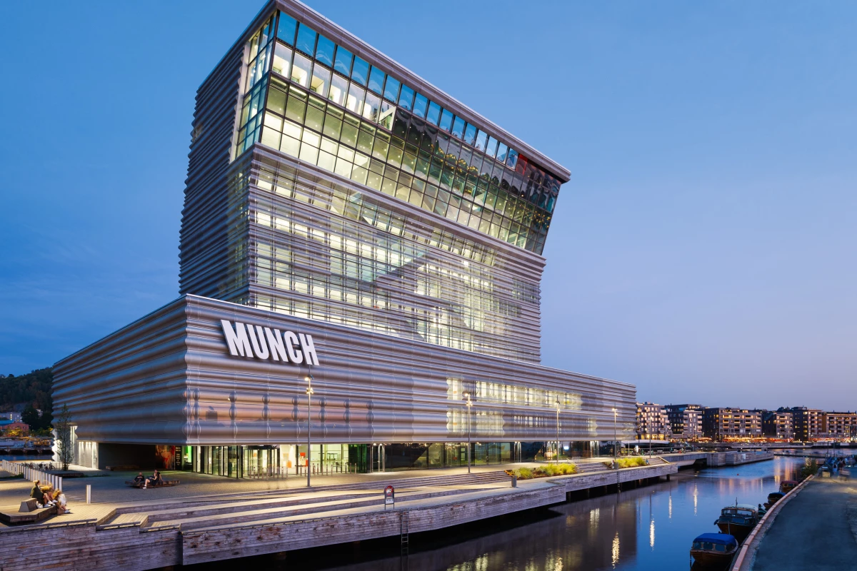 The Munch museum takes the form of a podium and tower and reaches a height of 60 m (200 ft)