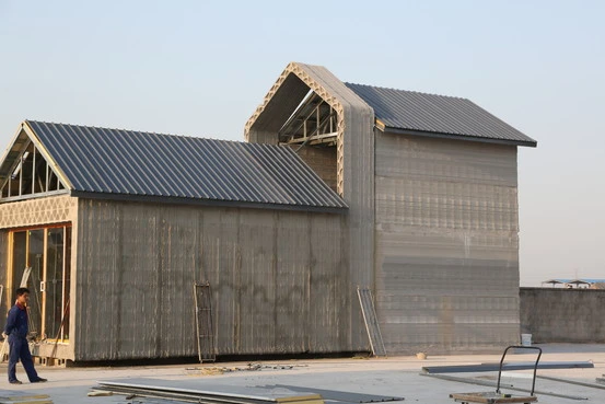 Small home constructed from 3D-printed building blocks (Image: Winsun New Materials)