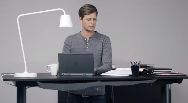 In height, Bekant adjusts from 22 to 48 in (56 to 122 cm) thanks to an "electric underframe" and control buttons on its side