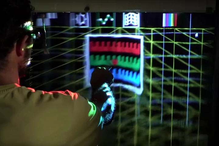 A new type of fog screen, called MistForm, can bend to keep objects in focus and undistorted