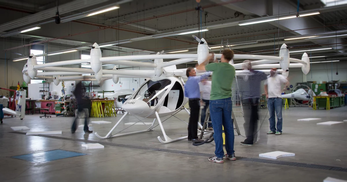 The e-volo team checks the Volocopter in preparation for its first flights