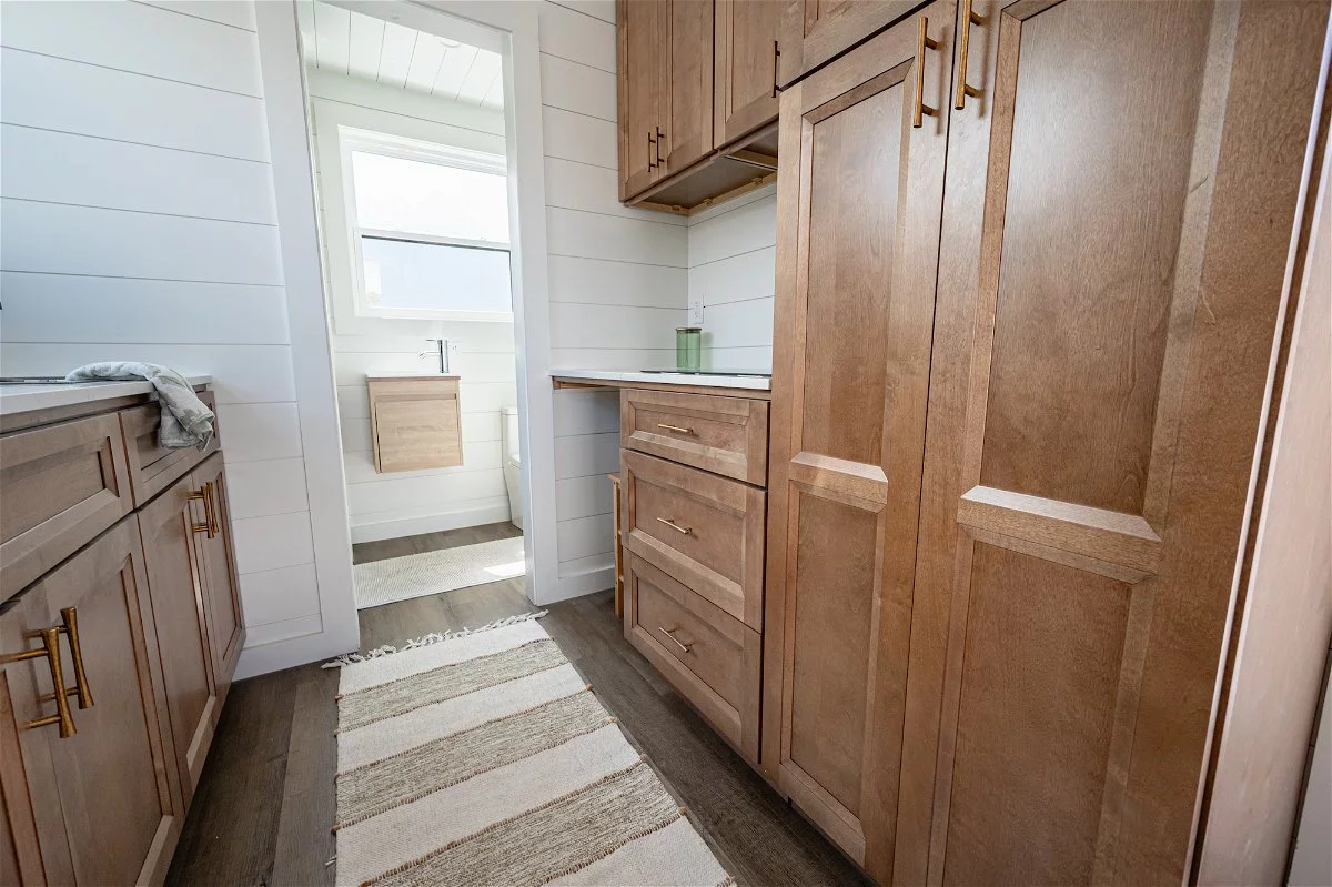 The Overlook's kitchen has quite a lot of cabinetry for a tiny house of its size