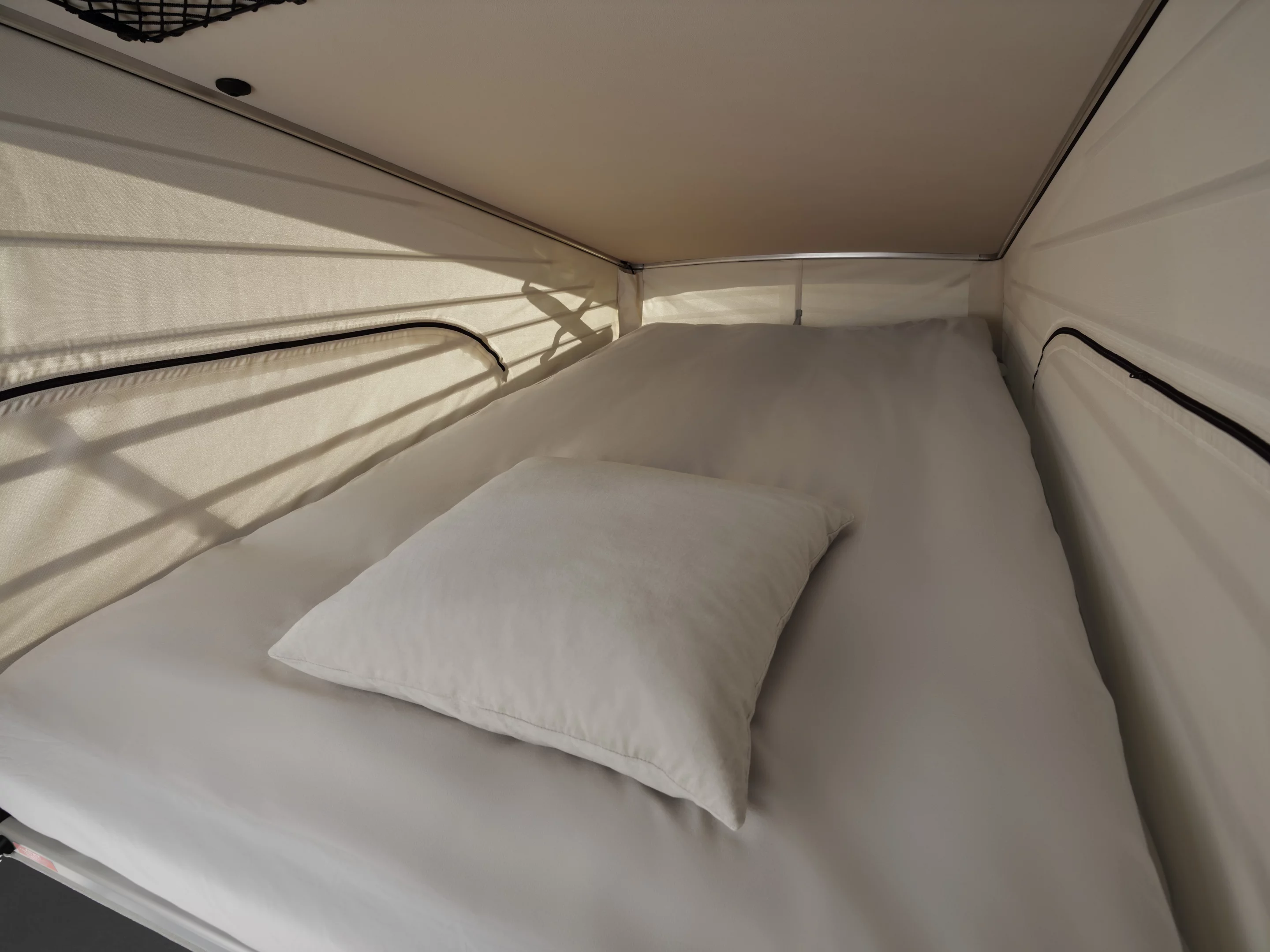 The pop-up roof area wiith bed