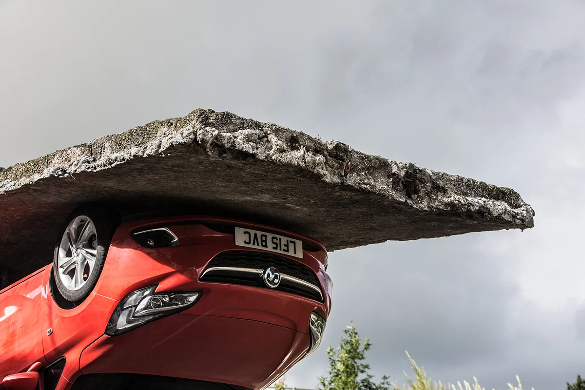 Pick yourself up and pull yourself together was a feat of structural engineering tearing up tarmac and supporting a car upside down