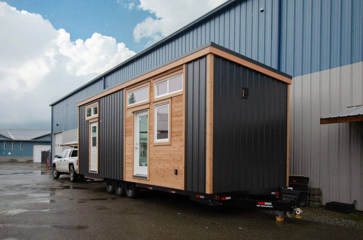 Extra-wide tiny house skips loft bedroom for comfortable small living