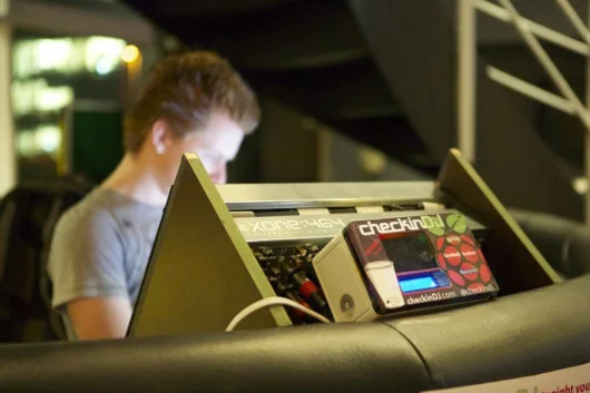 CheckinDJ generates playlists based on the preferences of the crowd