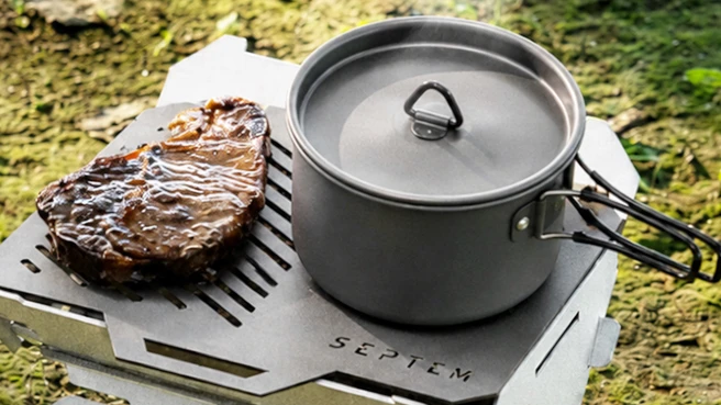 The grill offers multiple cooking surfaces