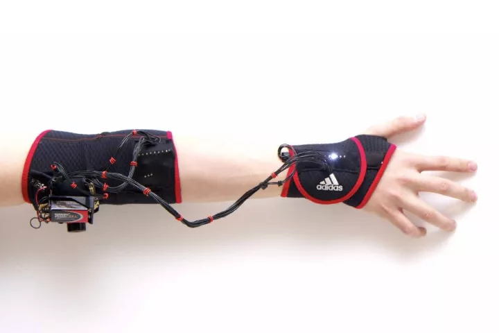 Ghost is a prototype vibrating armband, designed to help athletes with muscle memory