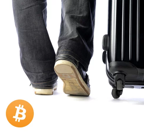 Bitcoin logo with traveler