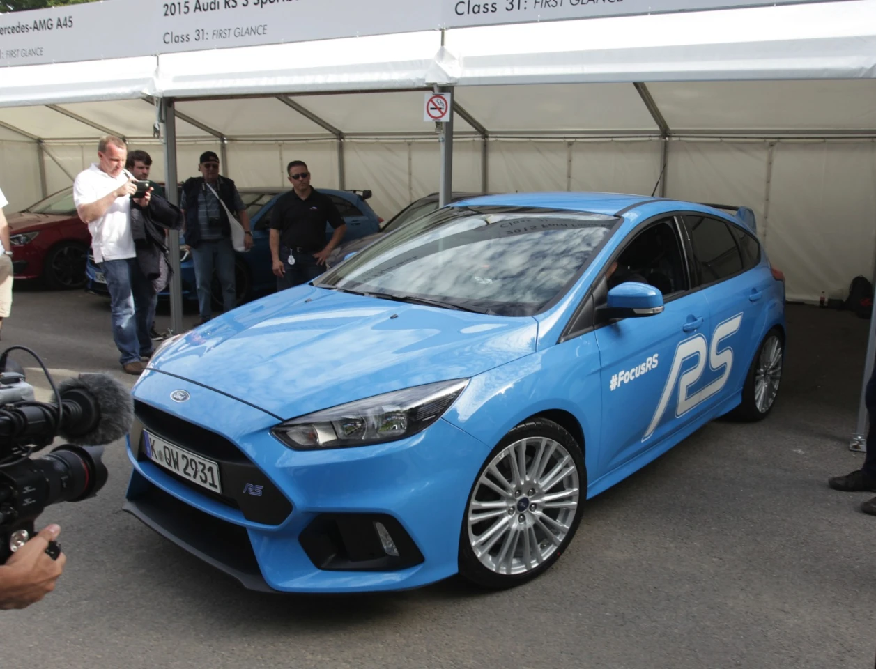 Ford demonstrated the performance of the all-new Focus RS to the public for the first time at the 2015 Goodwood Festival of Speed, where World Rallycross star Ken Block tackled the hillclimb at the wheel of a prototype car. The Focus RS is the first Ford RS model equipped with selectable Drive Modes (including a Drift Mode that allows controlled oversteer drifts) and launch control. The 2.3-litre all-aluminium four-cylinder EcoBoost borrowed from the Ford Mustang has been significantly upgraded for the Focus RS to deliver 10 per cent more power with 350 PS maximum output.