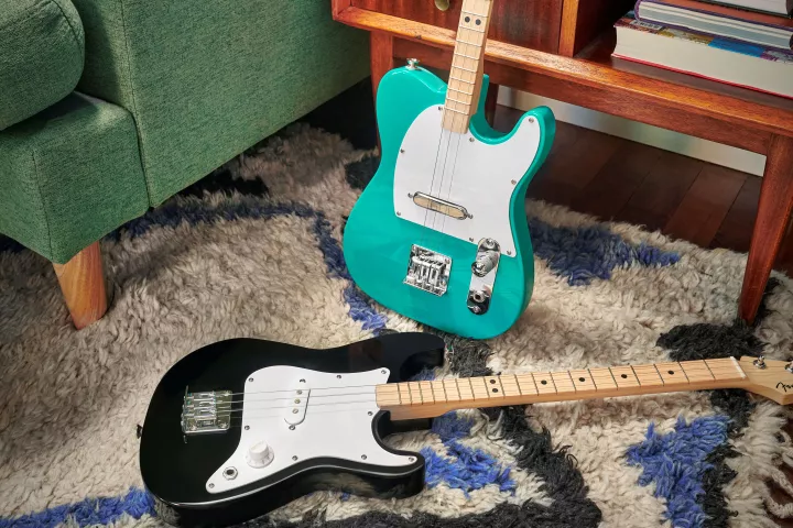 Just like the real thing, only smaller, lighter and rocking three strings