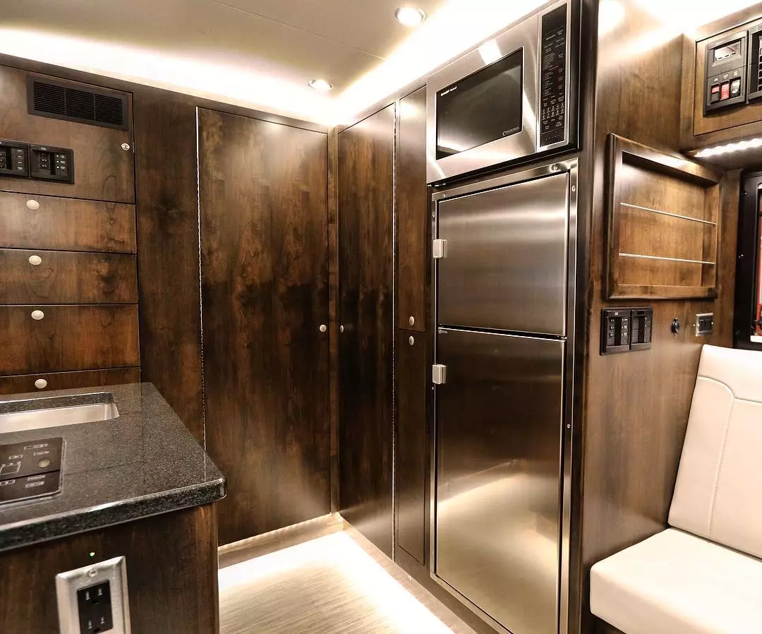 EarthRoamer offers a variety of wood finishes, real and synthetic leather upholstery, and trim options