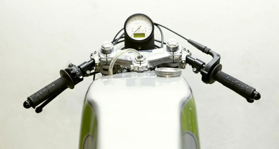 The Motogadget clock with the LCD screen looks completely out of place on the Ossa Copa 250 Grand Prix