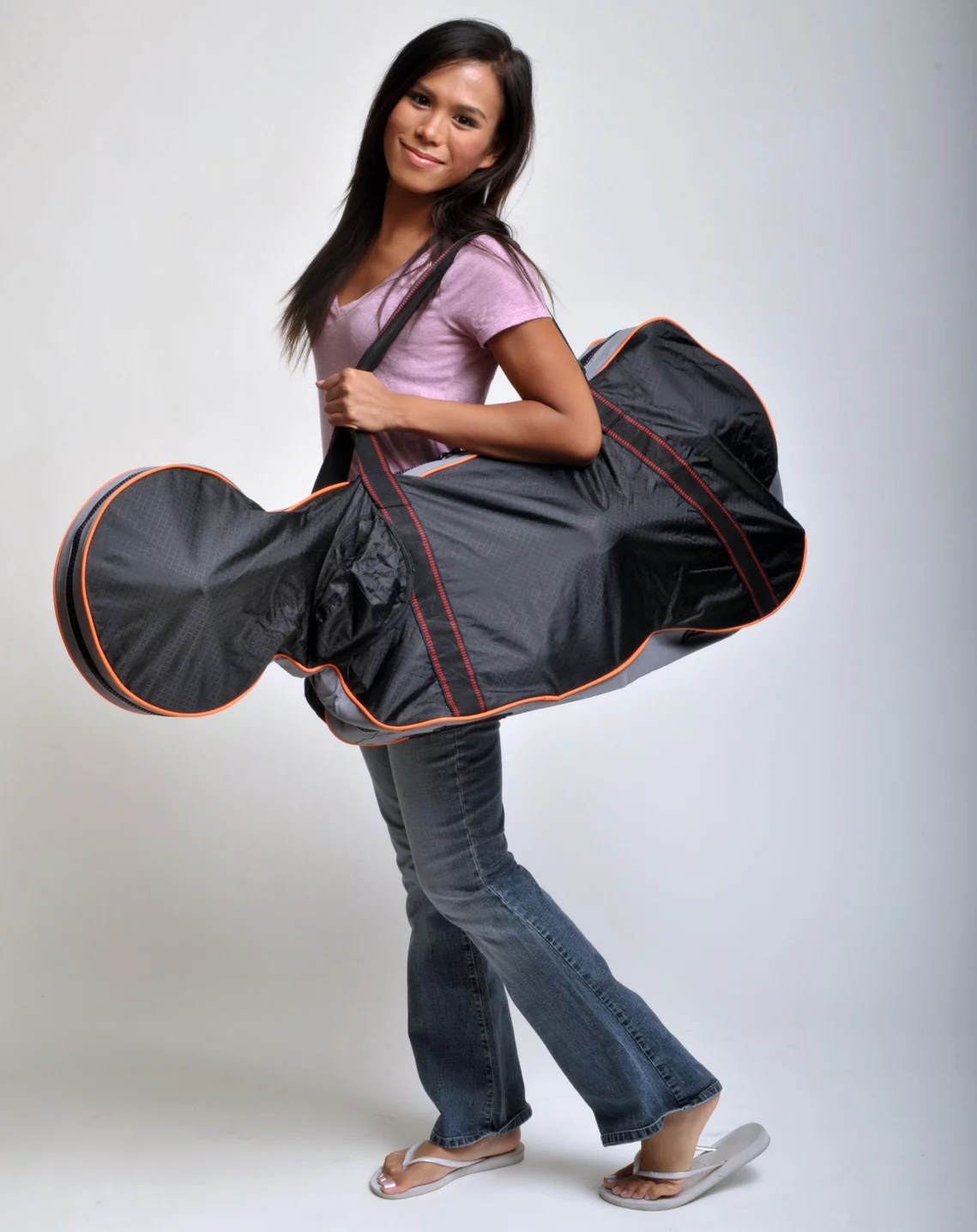 The VeloMini folding electric bike in its carry case