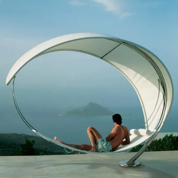 The Wave outdoor furniture piece is whatever you make it to be- a sun chair, a hammock or umbrella