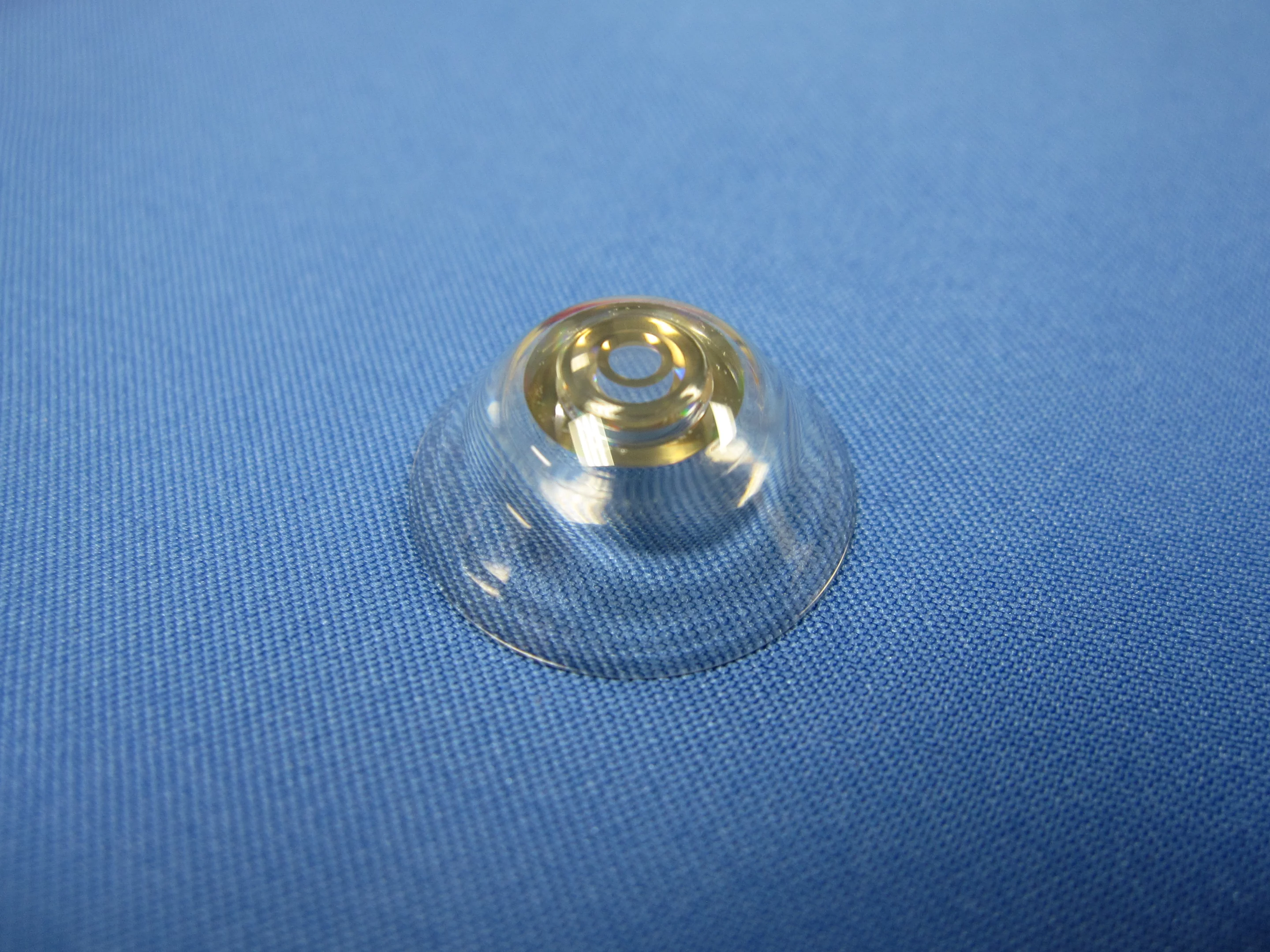 Researchers have created prototype wink-controlled telescopic contact lenses (Photo: Eric Tremblay and Joe Ford/ EPFL)