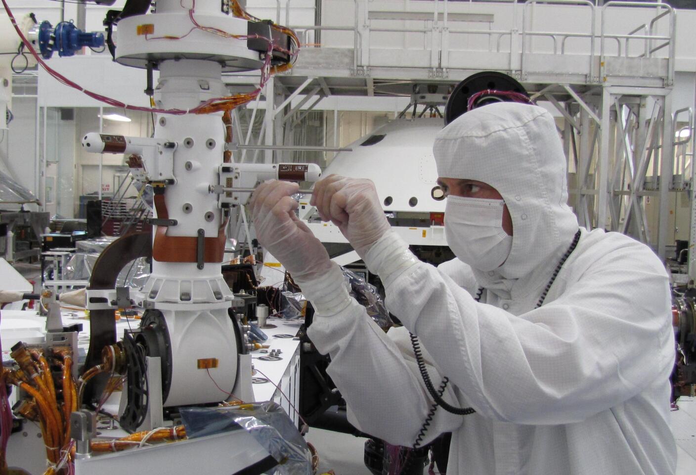 The Rover Environmental Monitoring Station (REMS) instrument being installed on Curiosity (Photo: NASA/JPL-Caltech)