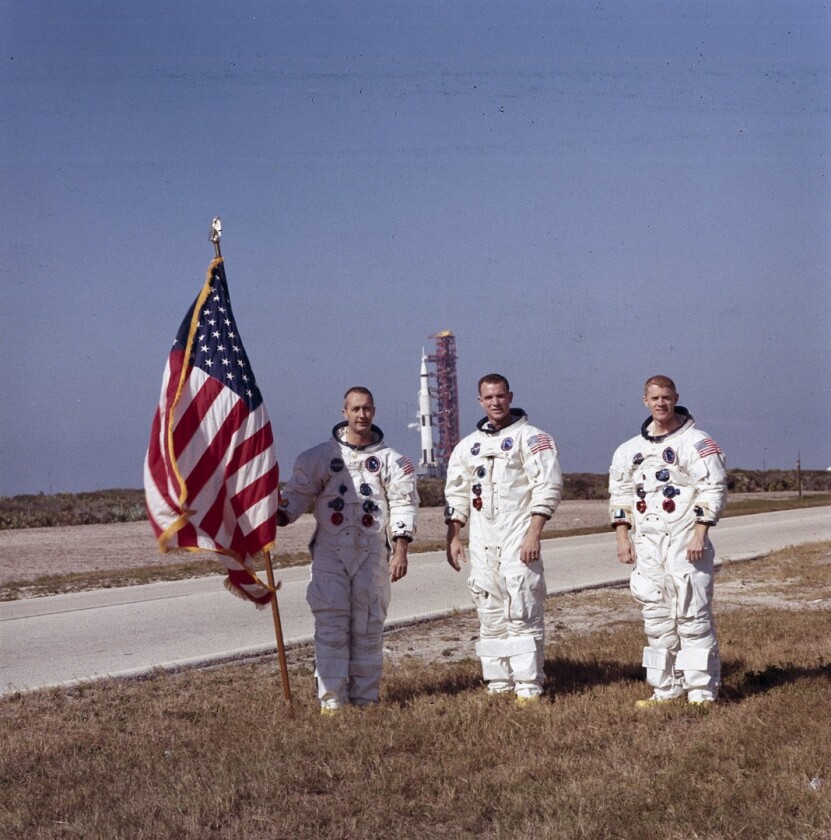 Apollo 9 crew and US flag