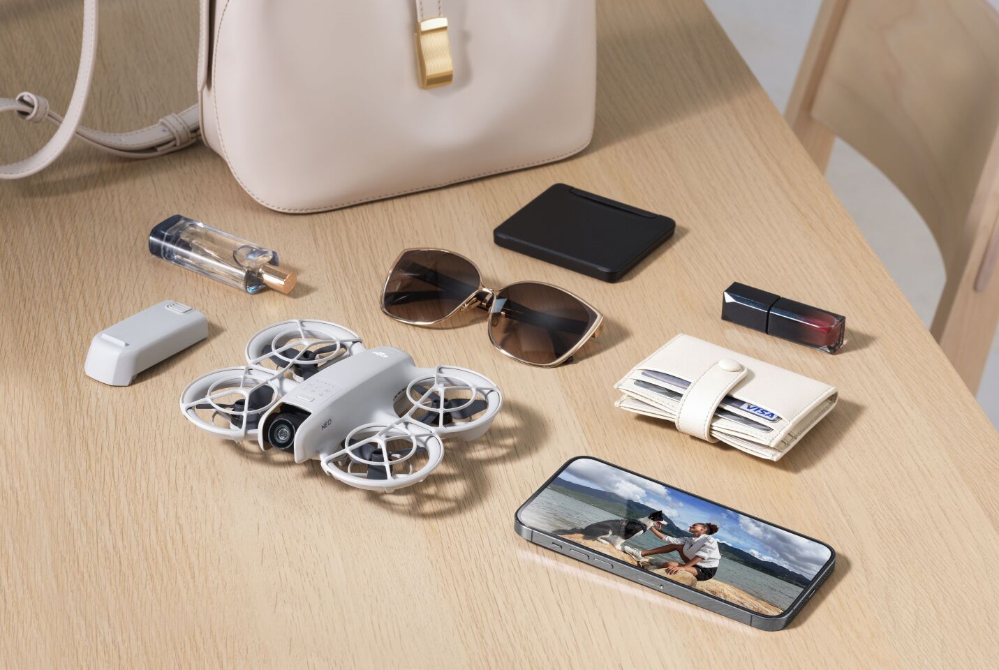 The DJI Neo is so small, it'll fit in your purse along with the rest of your purse-things